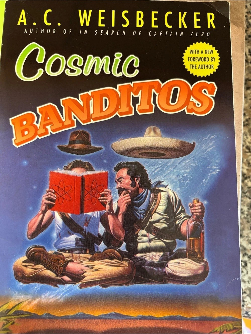 Cosmic Banditos Paperback Novel Blue & Orange